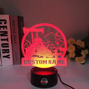 Personalized Dragster 3D LED Illusion Lamp featuring a custom name and racing number alongside a sleek dragster silhouette, glowing in a vibrant electric blue on a black base.
