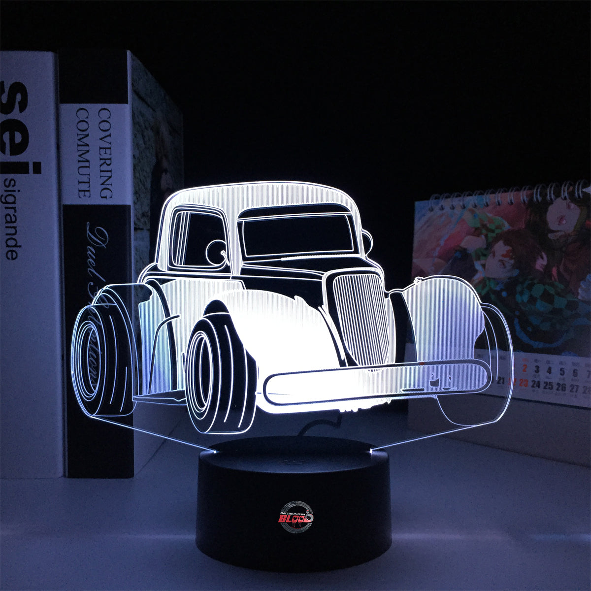 Personalized Legend Car LED Lamp featuring a custom name and racing number alongside a classic legend car silhouette, glowing in a vibrant electric blue on a black base.
