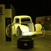 Personalized Legend Car LED Lamp featuring a custom name and racing number alongside a classic legend car silhouette, glowing in a vibrant electric blue on a black base.