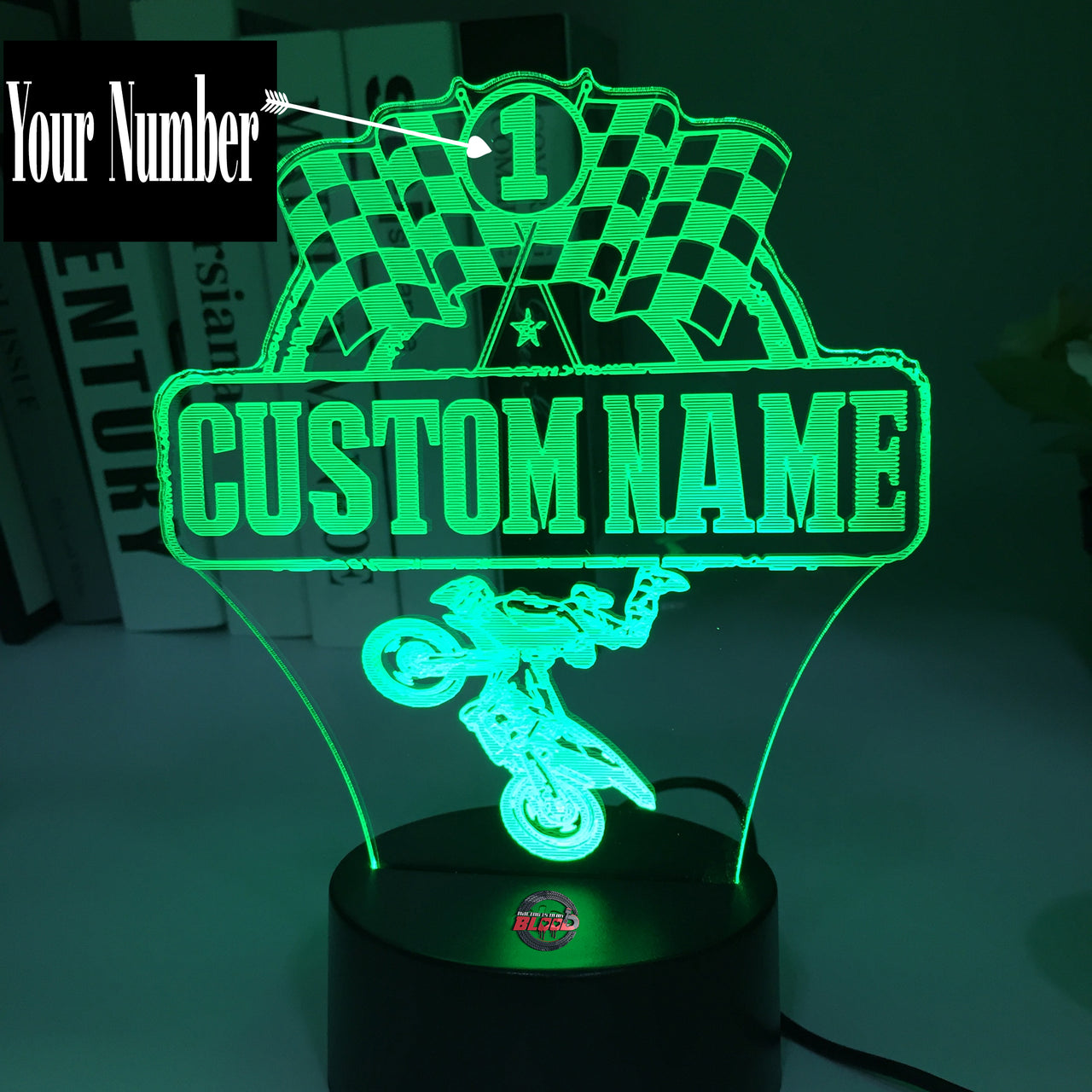 Personalized Motocross 3D LED Illusion Lamp featuring a custom name and racing number alongside a dirt bike rider silhouette, glowing in a vibrant orange on a black base.