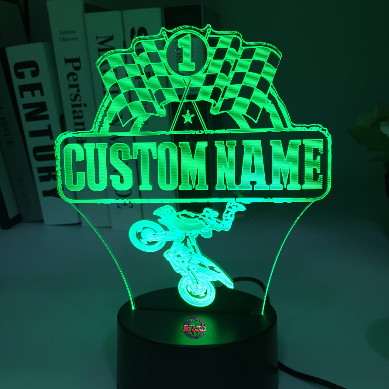 Personalized Motocross 3D LED Illusion Lamp featuring a custom name and racing number alongside a dirt bike rider silhouette, glowing in a vibrant orange on a black base.