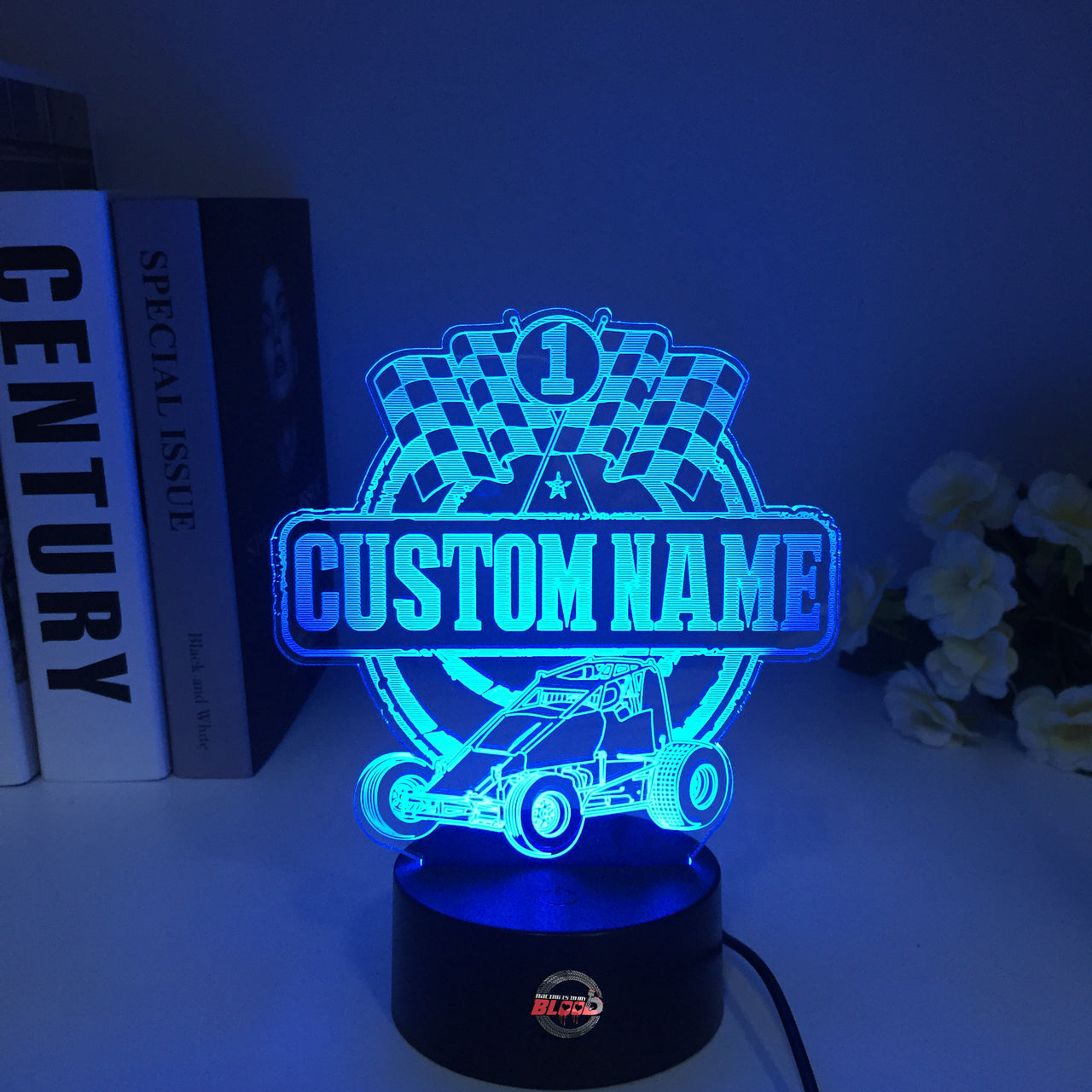 Personalized Non-Wing Sprint Car 3D LED Illusion Lamp featuring a custom name and racing number alongside a wingless dirt track sprinter silhouette, glowing in a vibrant yellow on a black base.
