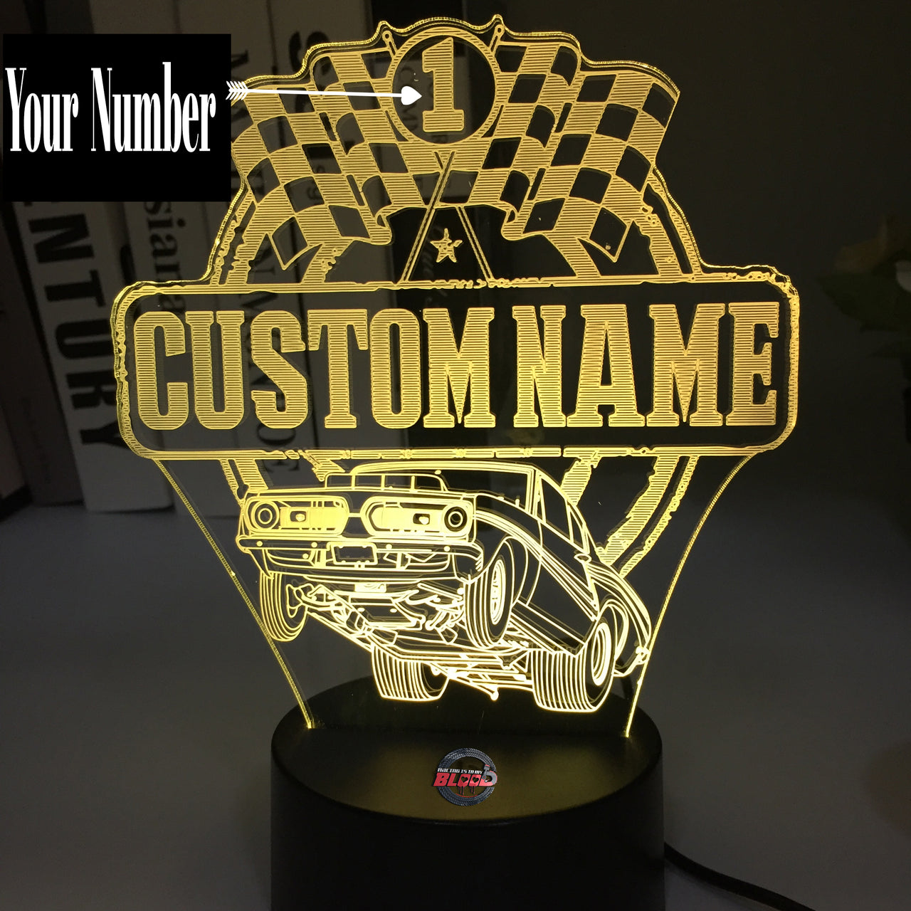 Personalized Super Stock Drag Racing 3D LED Illusion Lamp featuring a custom name and number alongside a wheel-standing muscle car silhouette, glowing in a vibrant blue on a black base.