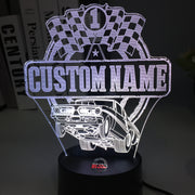 Personalized Super Stock Drag Racing 3D LED Illusion Lamp featuring a custom name and number alongside a wheel-standing muscle car silhouette, glowing in a vibrant blue on a black base.