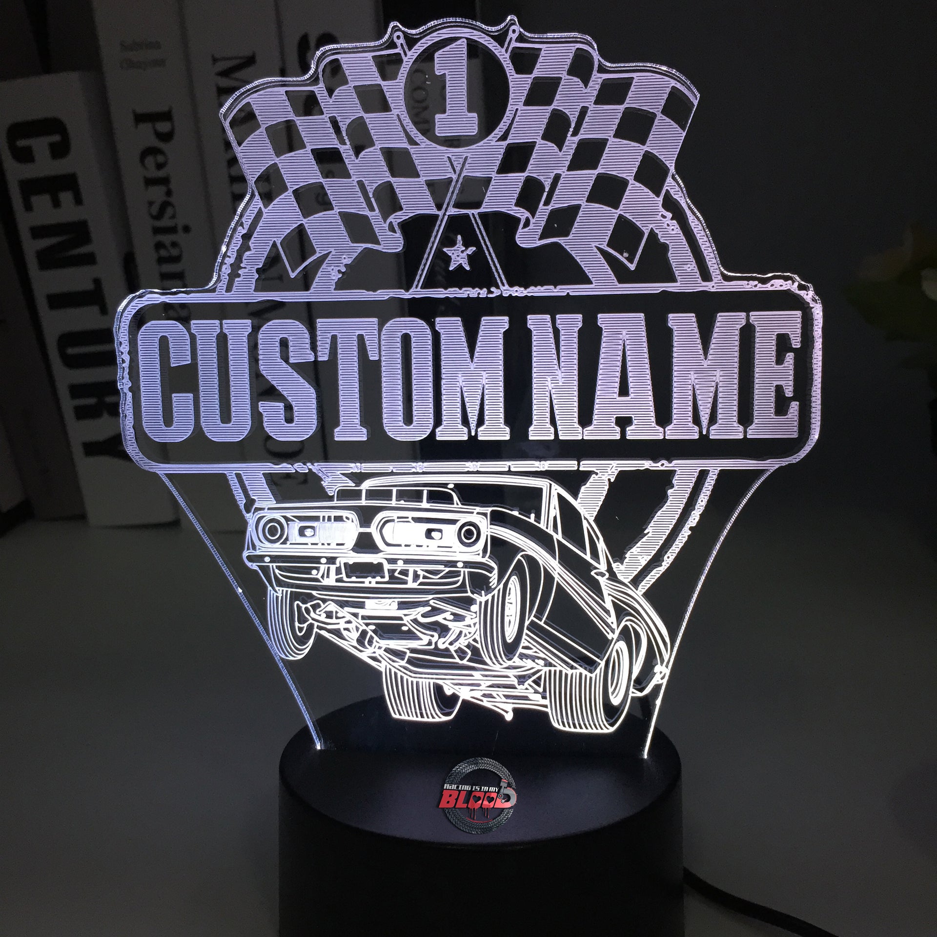 Personalized Super Stock Drag Racing 3D LED Illusion Lamp featuring a custom name and number alongside a wheel-standing muscle car silhouette, glowing in a vibrant blue on a black base.