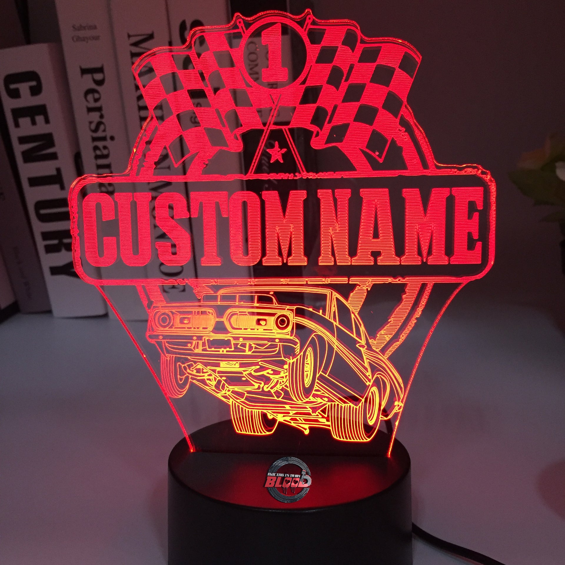 Personalized Super Stock Drag Racing 3D LED Illusion Lamp featuring a custom name and number alongside a wheel-standing muscle car silhouette, glowing in a vibrant blue on a black base.