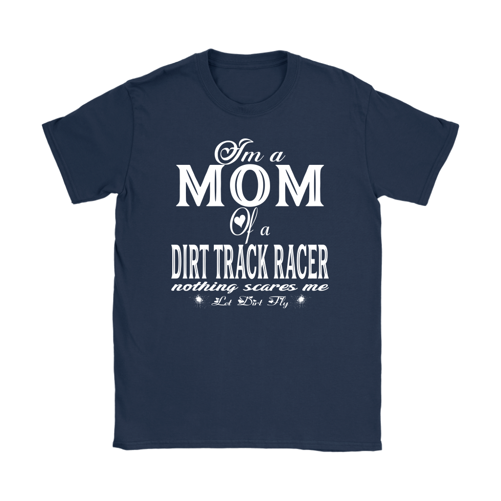Premium black apparel mockup featuring a woman sitting on the wooden grandstand bleachers at a dirt track arena, wearing a soft custom t-shirt with a bold white graphic that reads "I'm a MOM of a DIRT TRACK RACER nothing scares me".