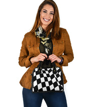Premium leather shoulder handbag featuring an all-over racing checkered flag print with durable carrying straps and a removable shoulder strap.