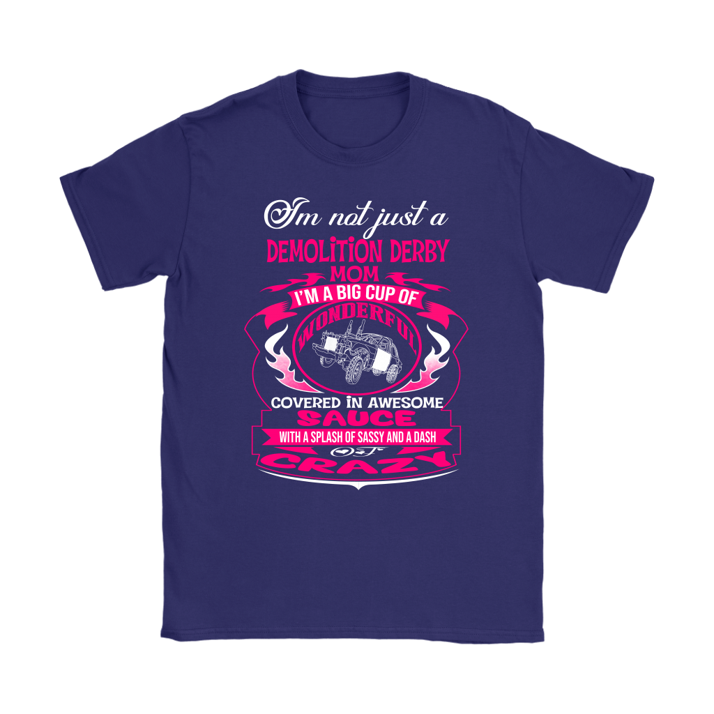 Premium women's black graphic t-shirt mockup featuring a vibrant pink and white custom design that reads "I'm not just a Demolition Derby Mom, I'm a big cup of wonderful covered in awesome sauce with a splash of sassy and a dash of crazy" with a derby car illustration.