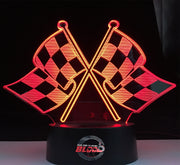 Racing Flag 3D LED Lamp featuring detailed crossed checkered flags glowing in a bright white on a modern black base.