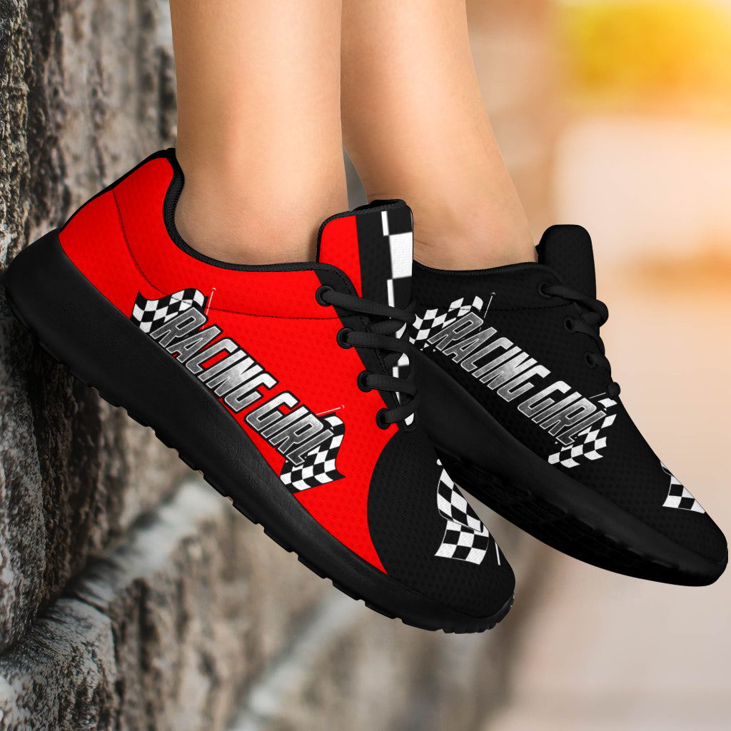 woman wearing a racing girl sneakers in red and black