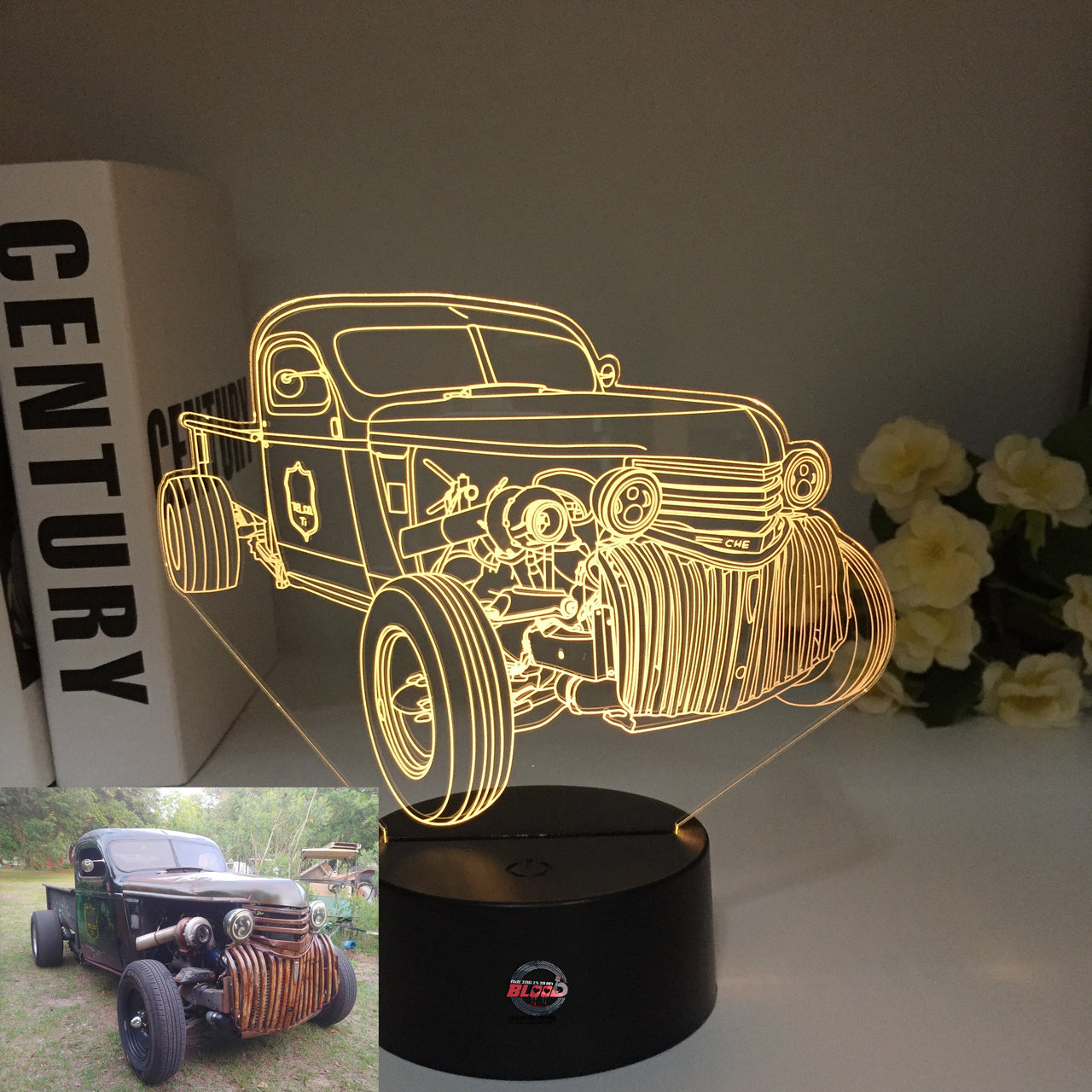Rat Rod Chevy Truck 3D LED Illusion Lamp showing a slammed custom classic truck silhouette in a vibrant orange glow on a premium black base.