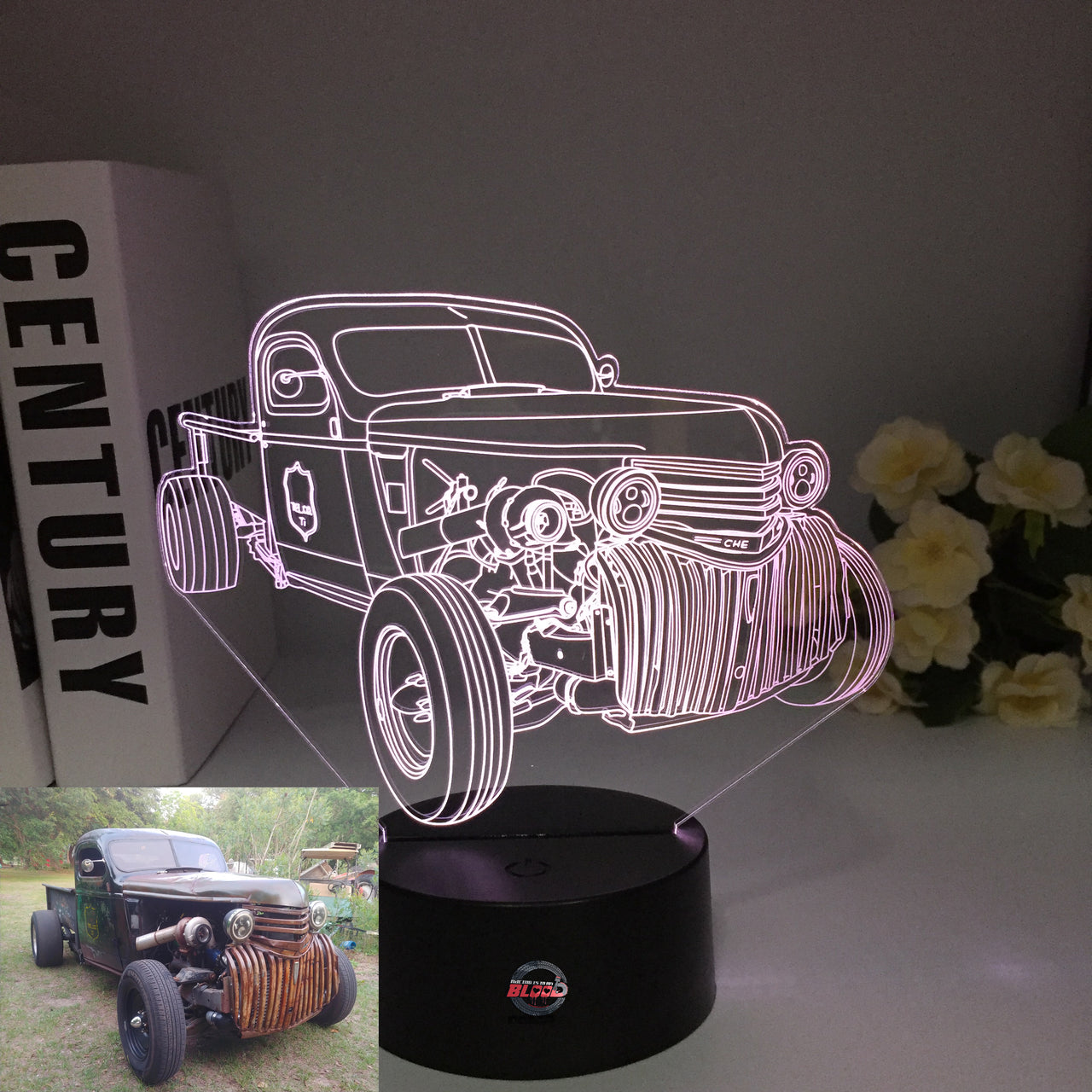 Rat Rod Chevy Truck 3D LED Illusion Lamp showing a slammed custom classic truck silhouette in a vibrant orange glow on a premium black base.