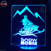Snowmobile 3D LED Lamp featuring a detailed modern sled silhouette glowing in a vibrant icy white on a premium black base.