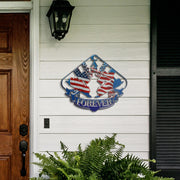 Sprint Car Racing Forever metal sign on white porch siding beside a wooden door and fern.