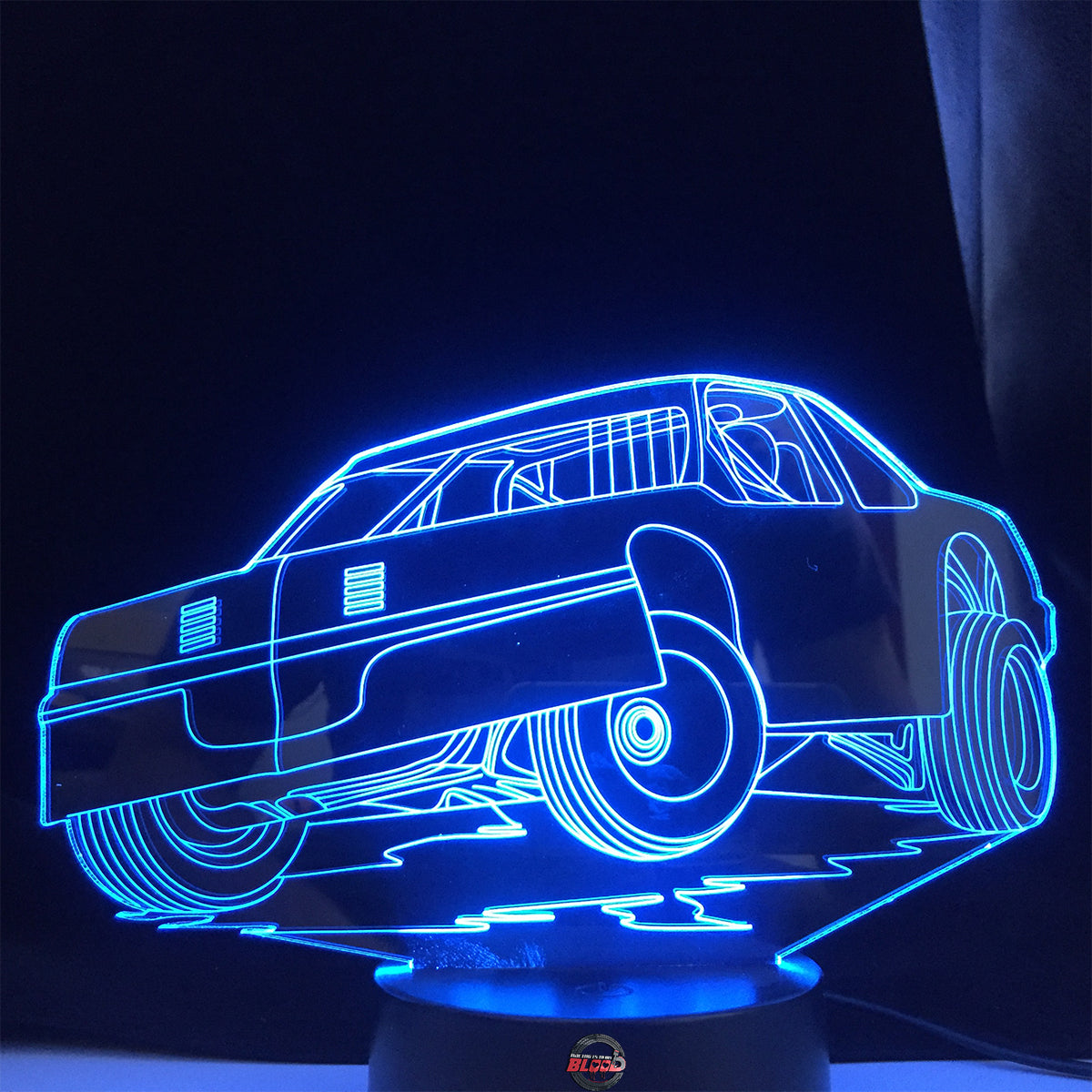 Street Stock 3D LED Lamp featuring a classic stock car silhouette glowing in a bright, race-ready green on a modern black base.