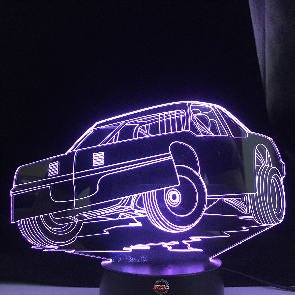 Street Stock 3D LED Lamp featuring a classic stock car silhouette glowing in a bright, race-ready green on a modern black base.