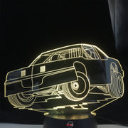 Street Stock 3D LED Lamp featuring a classic stock car silhouette glowing in a bright, race-ready green on a modern black base.