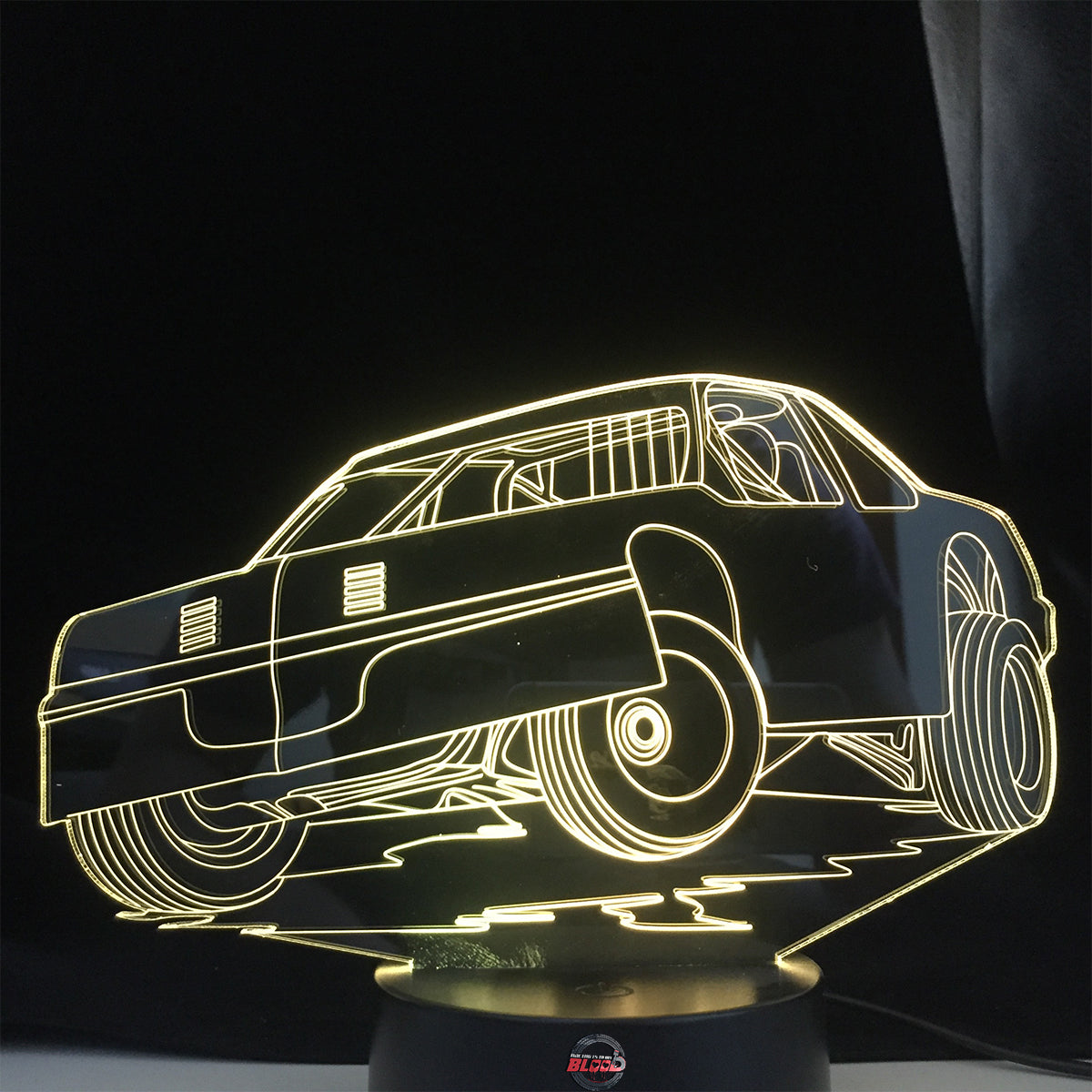 Street Stock 3D LED Lamp featuring a classic stock car silhouette glowing in a bright, race-ready green on a modern black base.