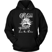 "The Best Kind Of Mom Raises A Race Car Driver" apparel collection featuring premium women's t-shirts, lightweight racerback tanks, and cozy fleece hoodies for racing families.