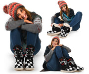 Woman modeling checkered-heart racing boots with cuffs upright and folded down in a three-photo collage.