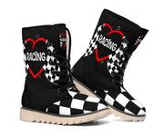 Angled pair of women's black racing boots with red heart graphics, checkered toes and black laces.