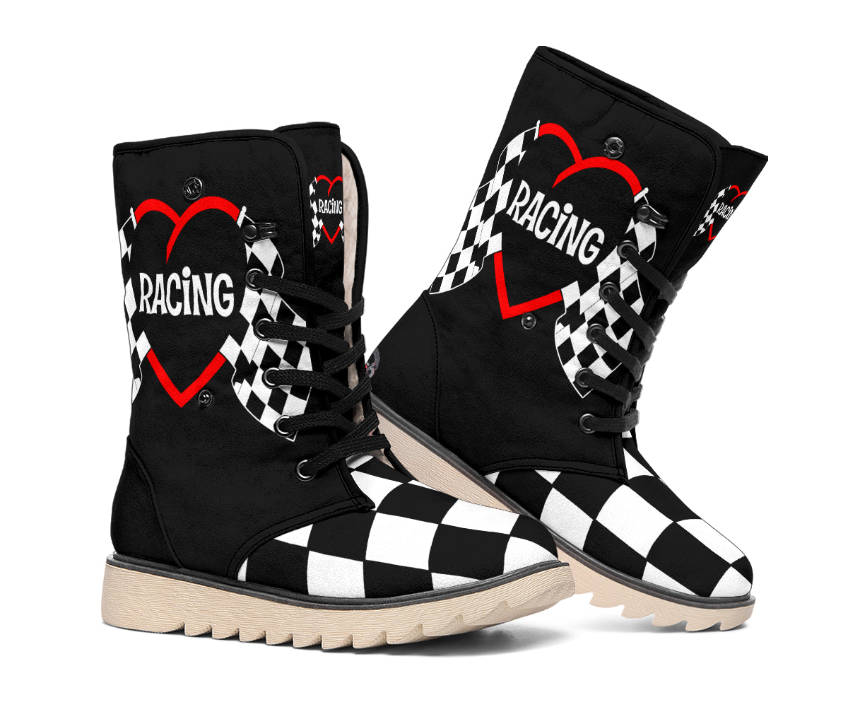 Angled pair of women's black racing boots with red heart graphics, checkered toes and black laces.