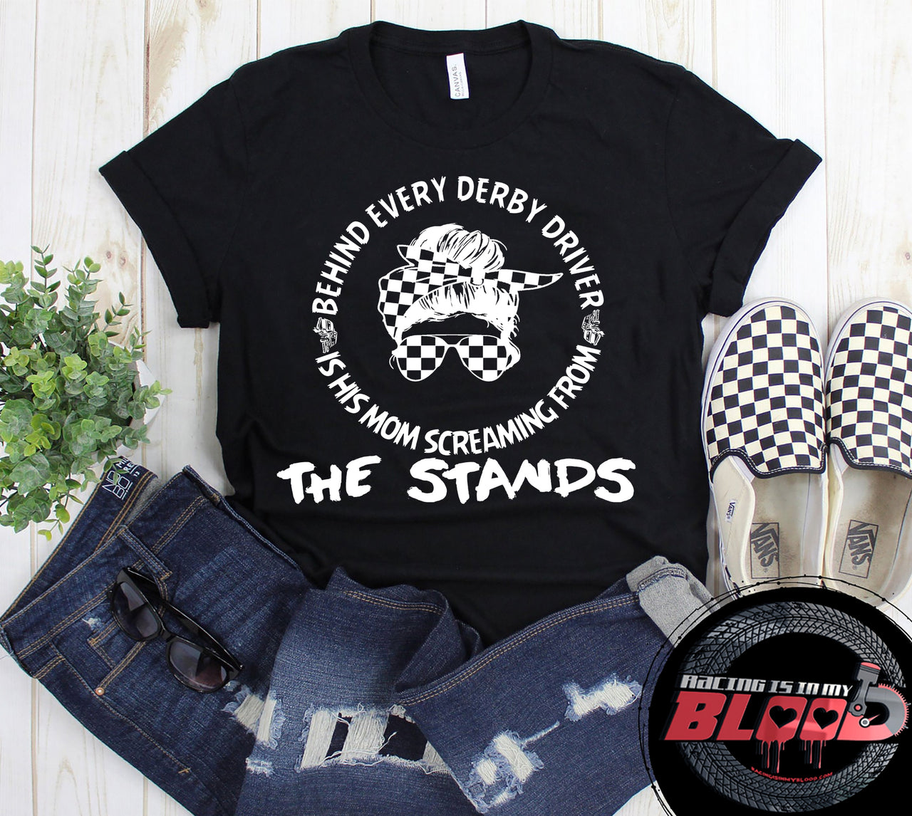Women's demolition derby apparel featuring the "Behind Every Derby Driver Is His Mom Screaming From The Stands" graphic, available in premium t-shirts, racerback tanks, and warm hoodies.