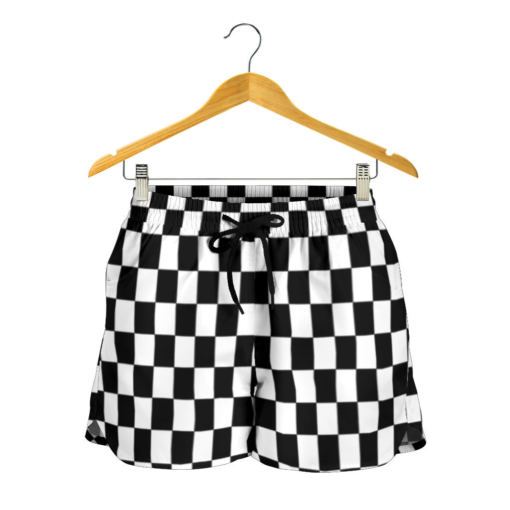 Women's high-performance athletic shorts featuring a bold black and white checkered flag pattern, designed with an elastic drawstring waist and functional side pockets.