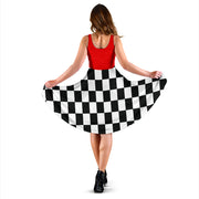 Women's midi dress featuring a mixed red and black checkered flag pattern, perfect for racing events and trackside fashion.