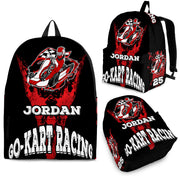 A fully personalized custom kart racing backpack displaying the name "Jordan" and the racing number "N25" in bold, dynamic motorsport typography, featuring heavy-duty black zippers, thick padded ergonomic shoulder straps, and a front utility pocket, isolated on a clean white background.
