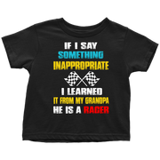A collection of a youth t-shirt, baby bodysuit, and hoodie displaying the funny quote "If I Say Something Inappropriate I Learned It From My Grandpa He Is A Racer" in bold, playful typography with racing flag accents, set against a clean white background.