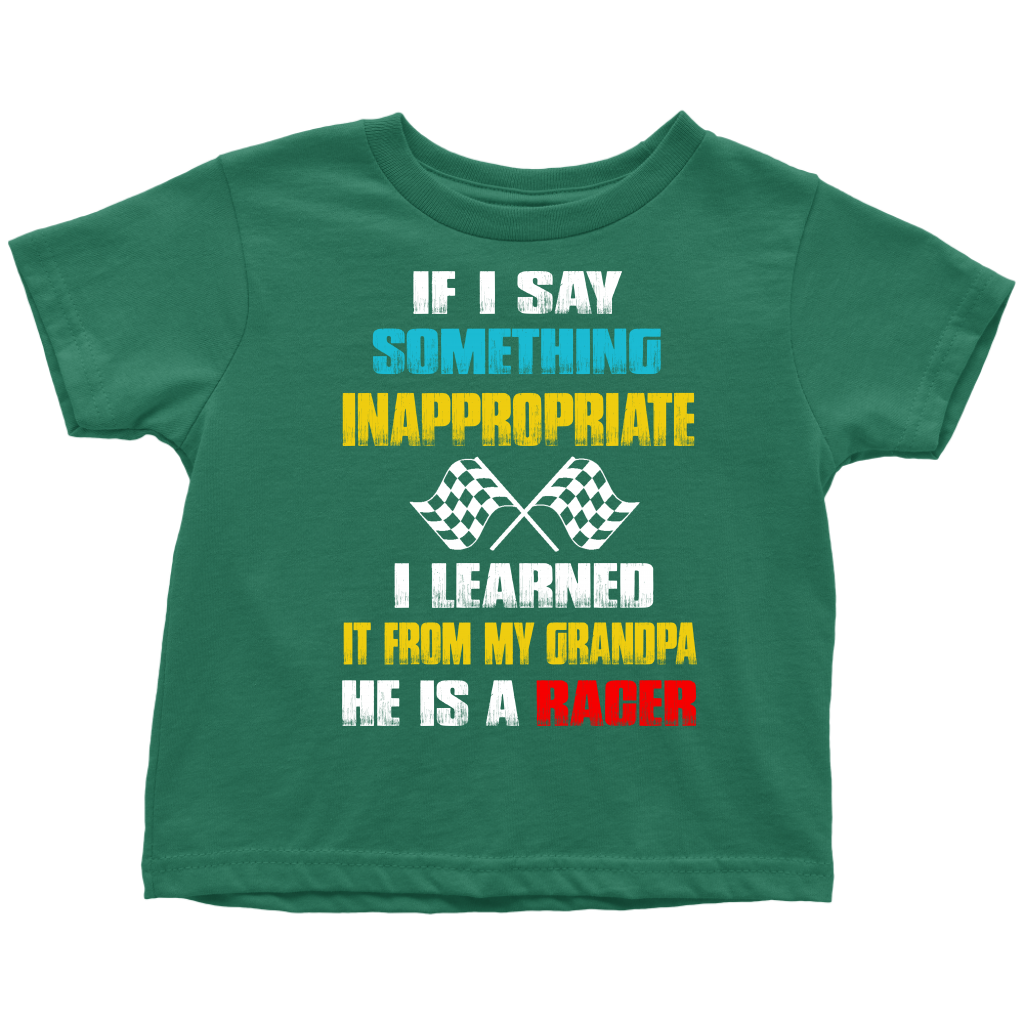 A collection of a youth t-shirt, baby bodysuit, and hoodie displaying the funny quote "If I Say Something Inappropriate I Learned It From My Grandpa He Is A Racer" in bold, playful typography with racing flag accents, set against a clean white background.