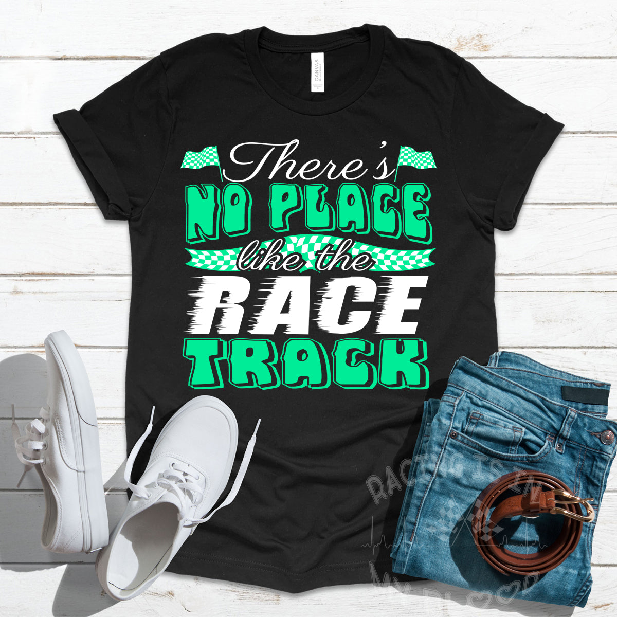 Green custom racing apparel featuring the phrase There's No Place Like The Race Track for stock car, drag racing, and dirt track fans.