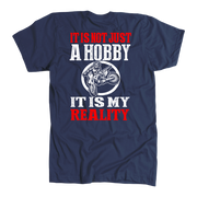 Custom motocross apparel featuring the quote It Is Not Just A Hobby It Is My Reality for dirt bike racers and supercross fans.