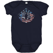 A flat lay photograph of a white infant bodysuit and toddler t-shirt printed with a faded American flag design layered behind an open-wheel dirt sprint car, shown completely isolated against a blank background.